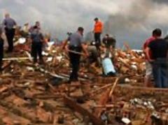 Oklahoma tornado: Harrowing moment lifeless body of a little girl is found buried in rubble