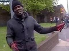 woolwich attack: shocking video taken by eyewitnesses to slaughter of soldier in which 'killer' blames british government and apologises to women who saw it
